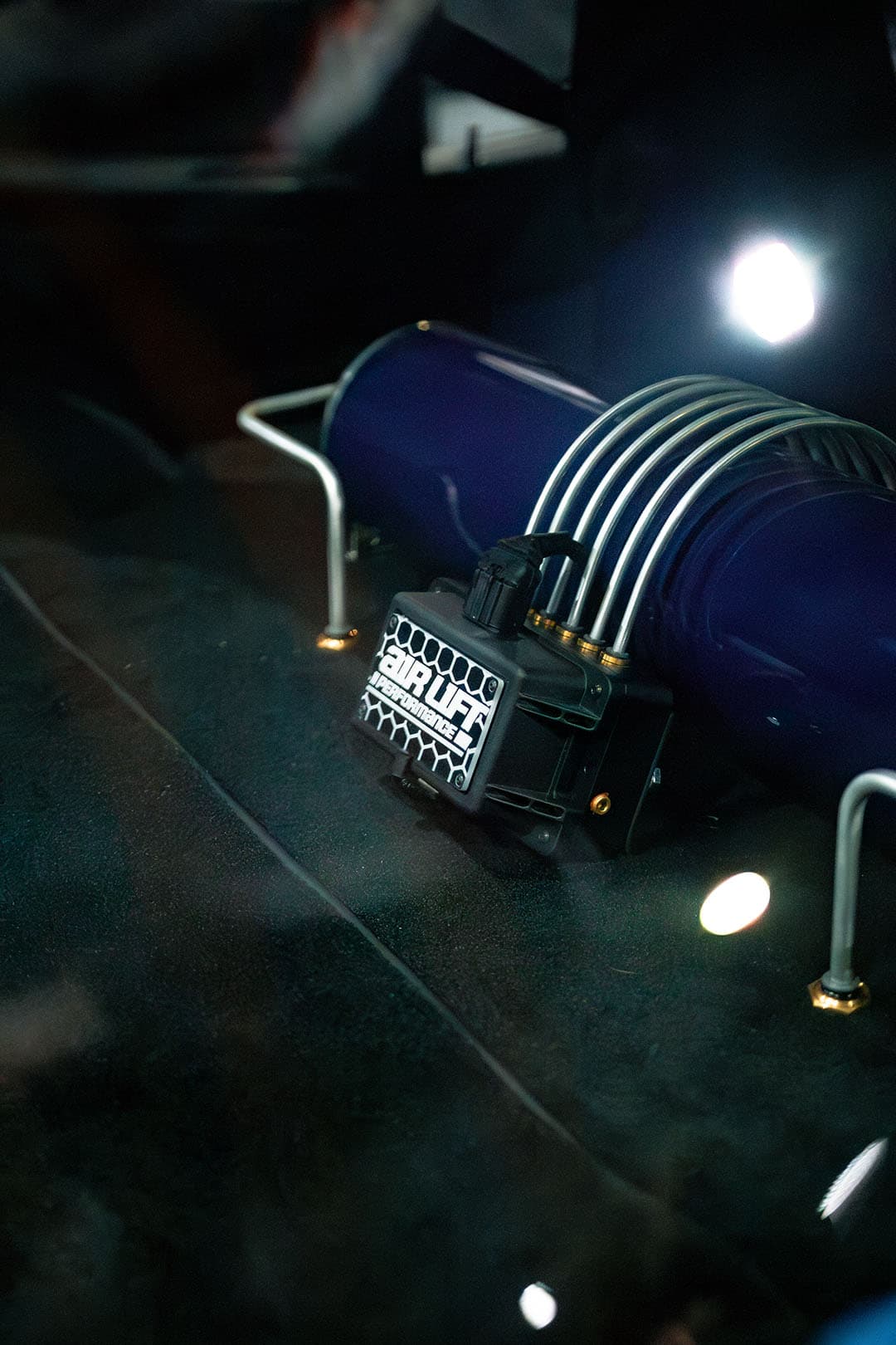 Vehicle featured at Ultimate Dubs UK 2024 with Air Lift Performance